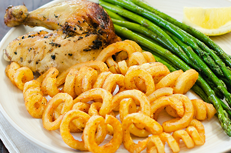 Chicken with Baked Curly Fries and Asparagus